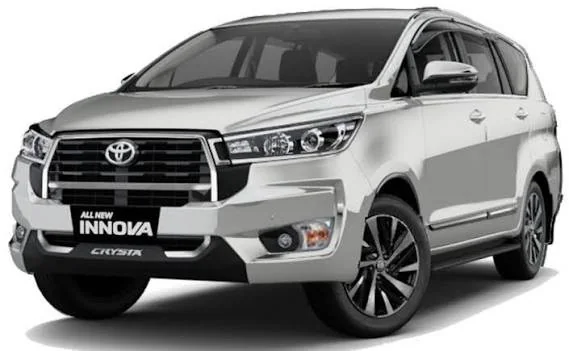 White Toyota Innova Crysta